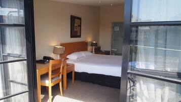 Executive Room with Balcony | Individually furnished, desk, iron/ironing board, free WiFi