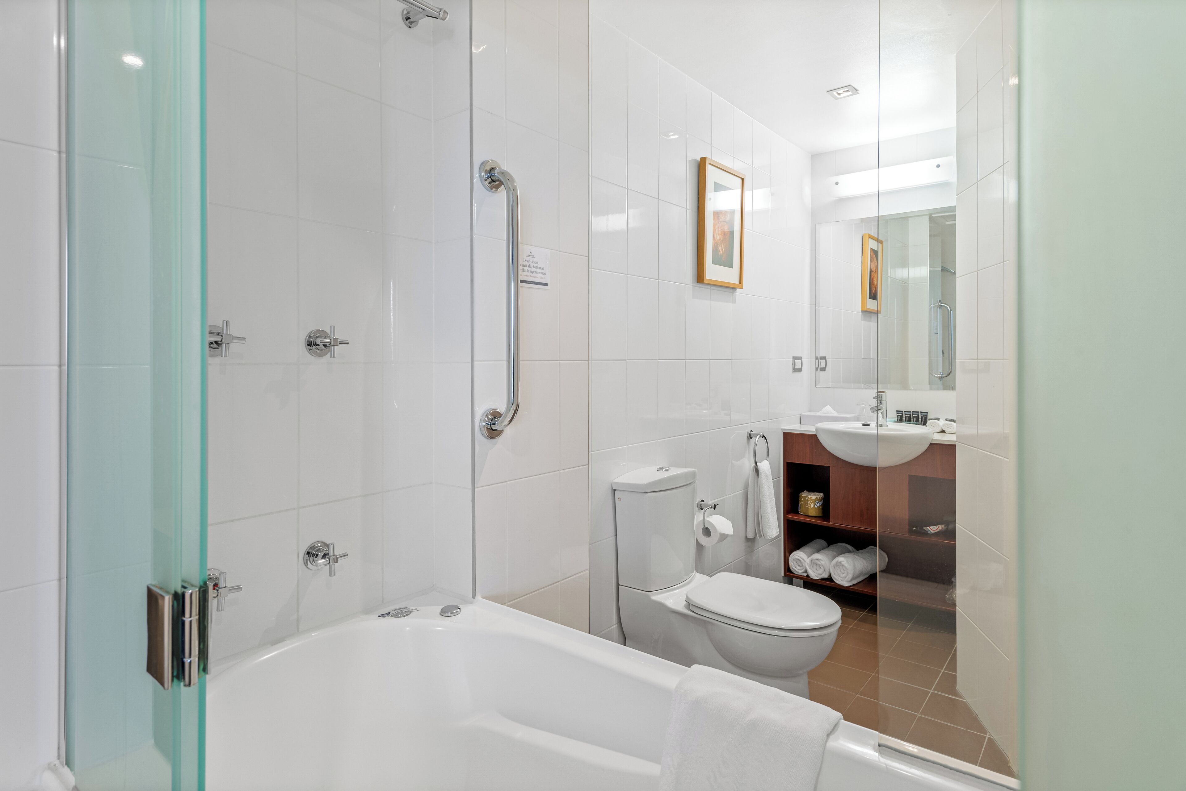 king room with spa bath & balcony | bathroom | designer toiletries, hair dryer, bathrobes, towels