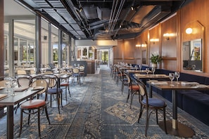 Breakfast, lunch, dinner served; local cuisine, garden views