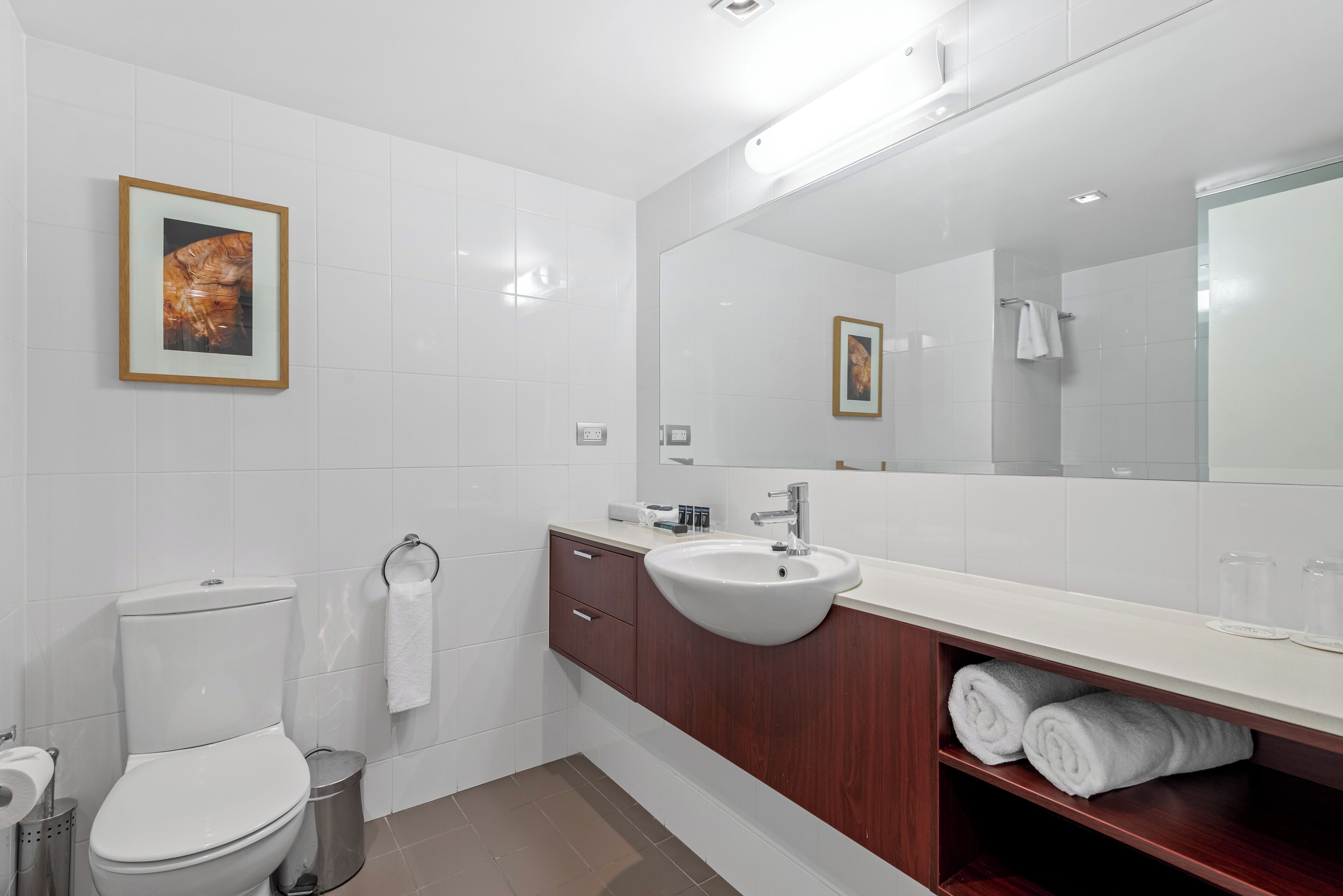 designer toiletries, hair dryer, bathrobes, towels