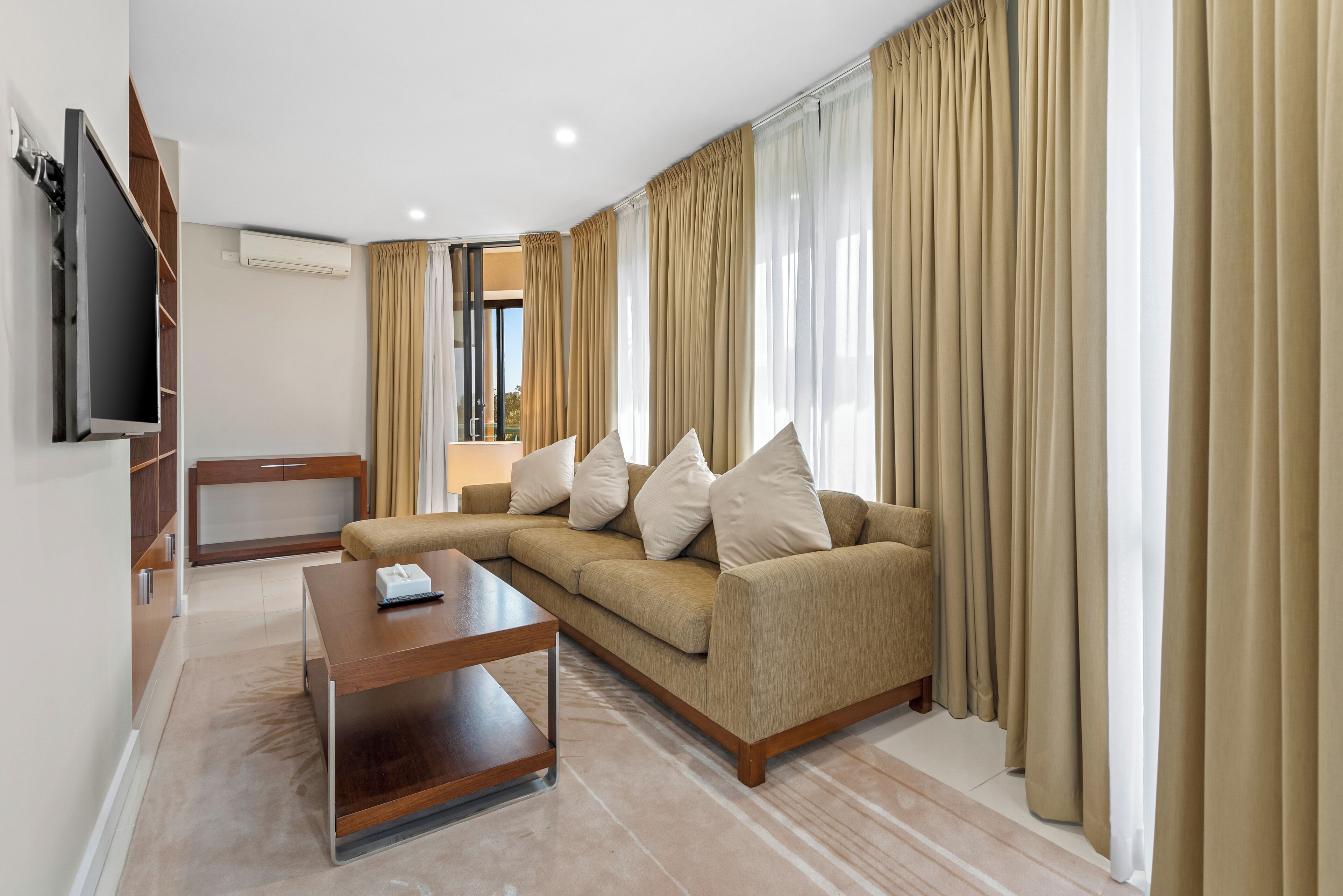 premium penthouse | living area | 40-inch lcd tv with satellite channels, tv, ipod dock