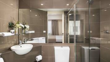 Shower, eco-friendly toiletries, hair dryer, towels