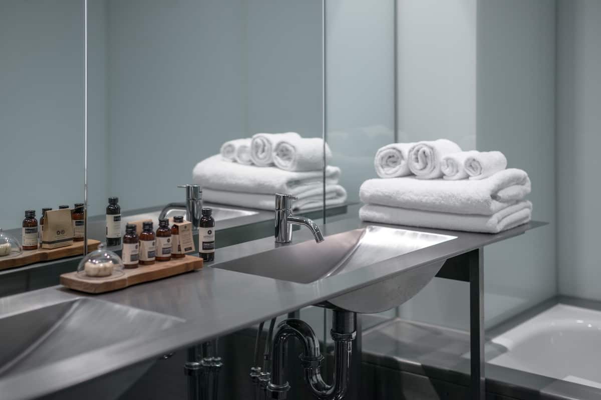 shower, rainfall showerhead, designer toiletries, hair dryer