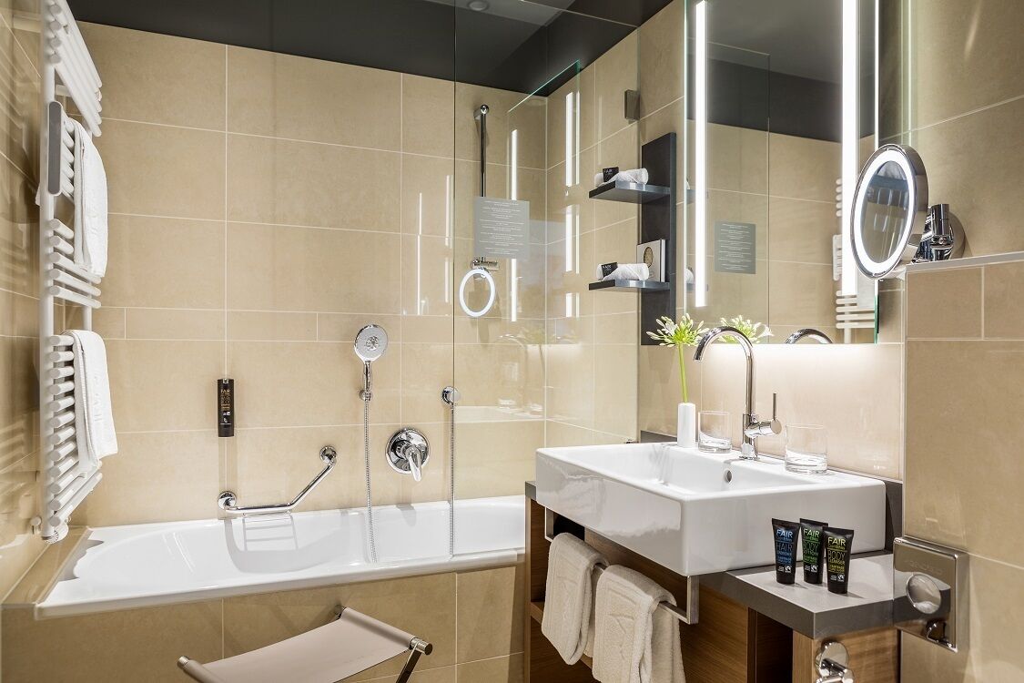 eco-friendly toiletries, hair dryer, bathrobes, slippers