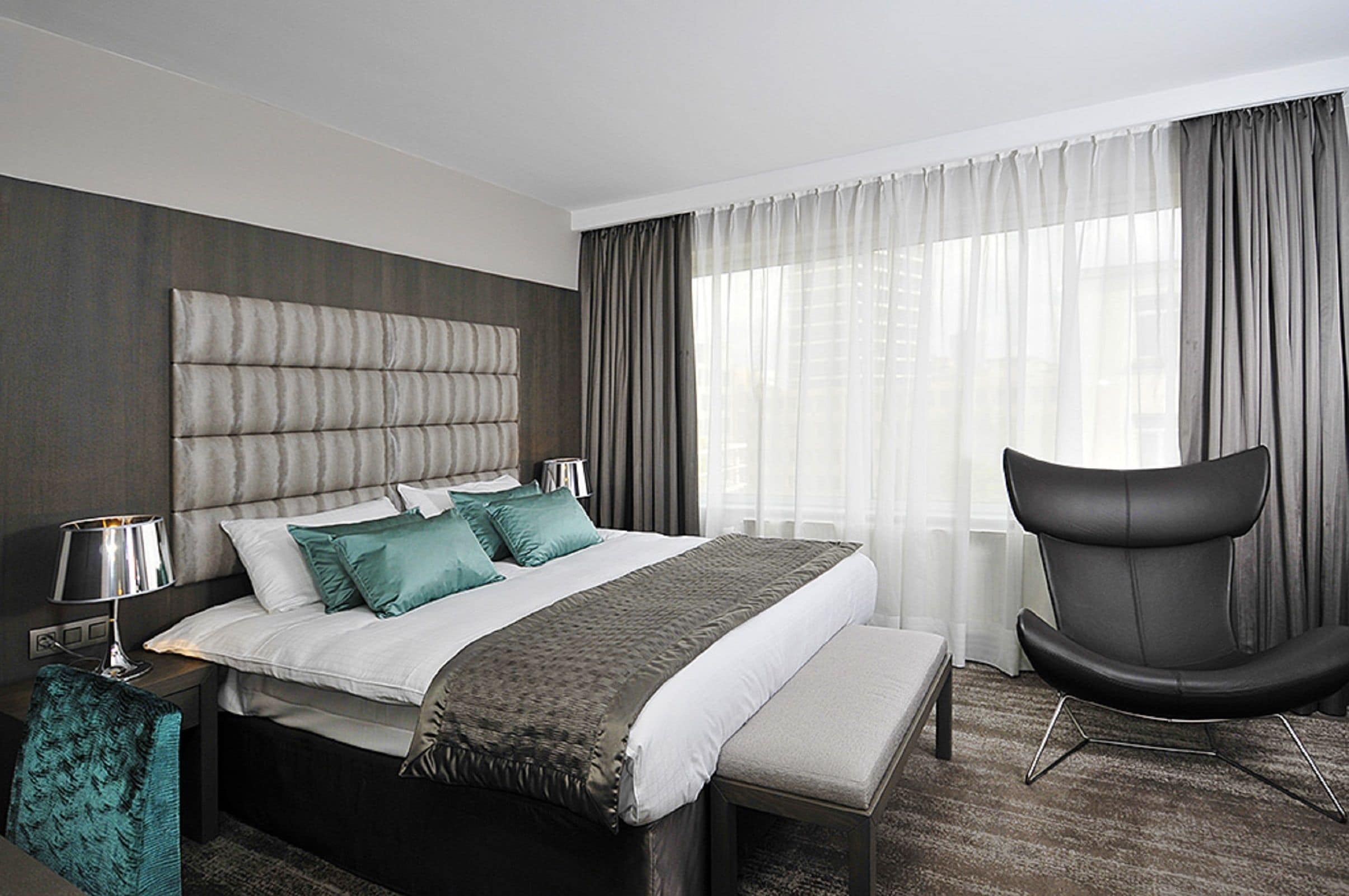 Deluxe Double Room, Kitchenette | Minibar, in-room safe, desk, iron/ironing board