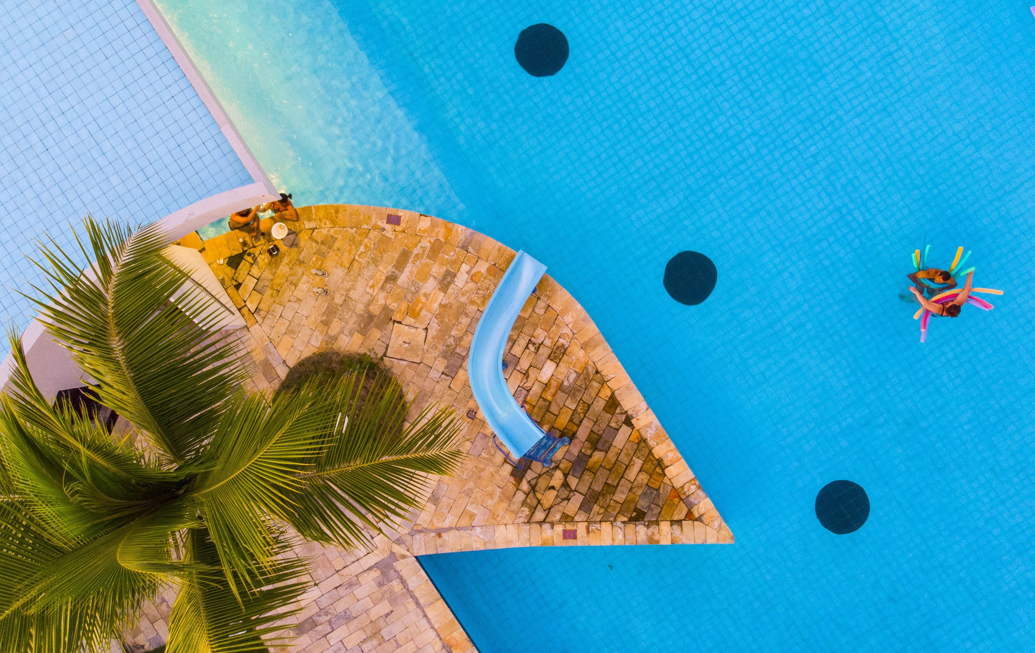 outdoor pool, open 8 am to 8 pm, pool umbrellas, pool loungers