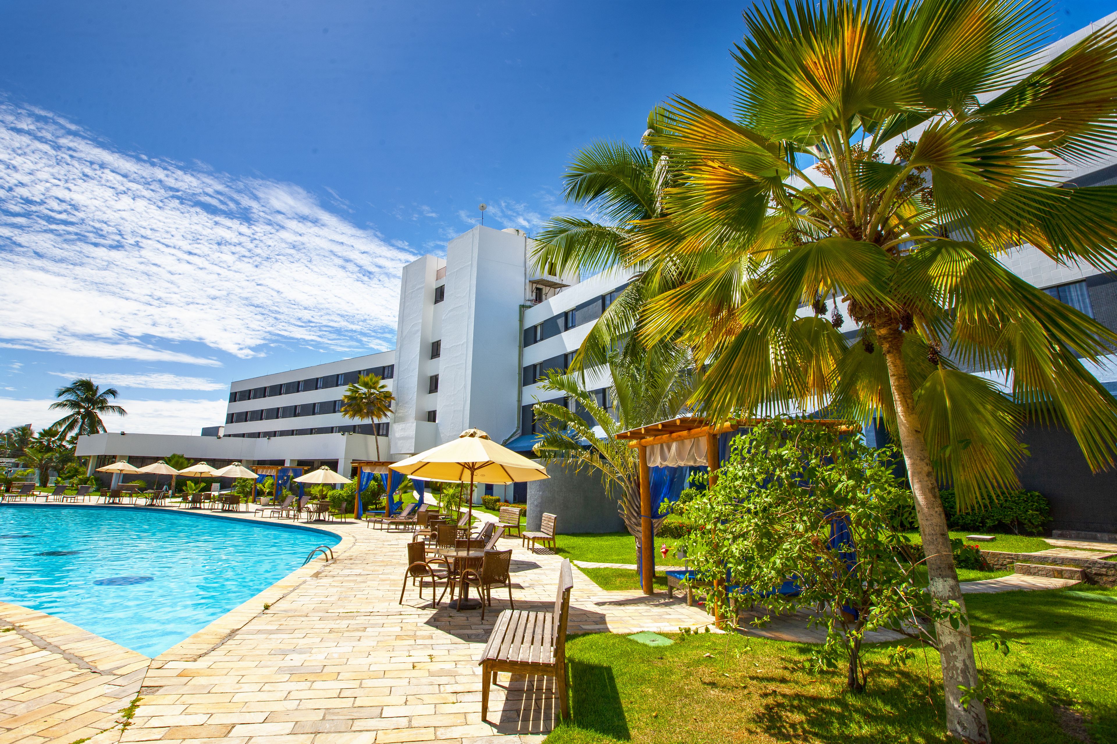 outdoor pool, open 8 am to 8 pm, pool umbrellas, pool loungers