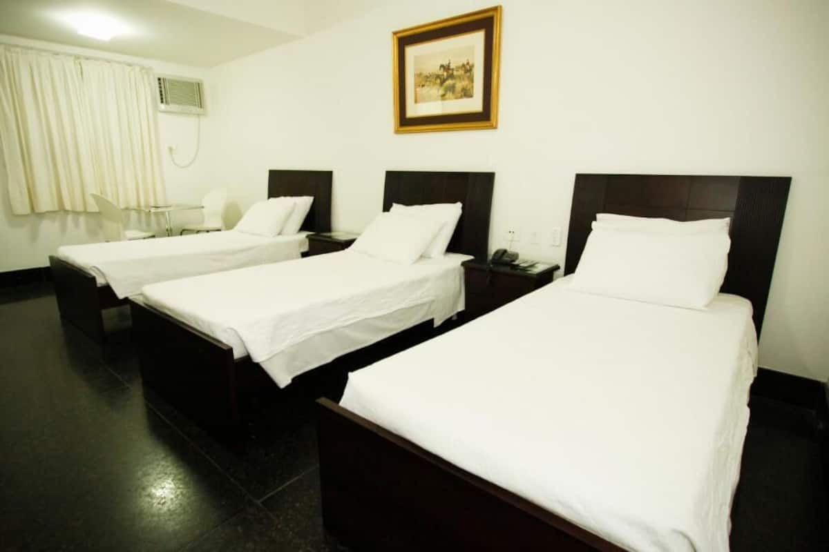 Executive Triple Room | Minibar, laptop workspace, blackout curtains, free WiFi