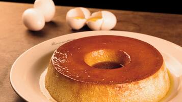 A caramel flan on a plate.