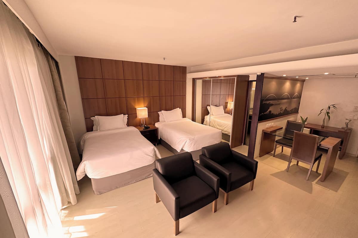 Deluxe Single Room | 1 bedroom, minibar, in-room safe, desk