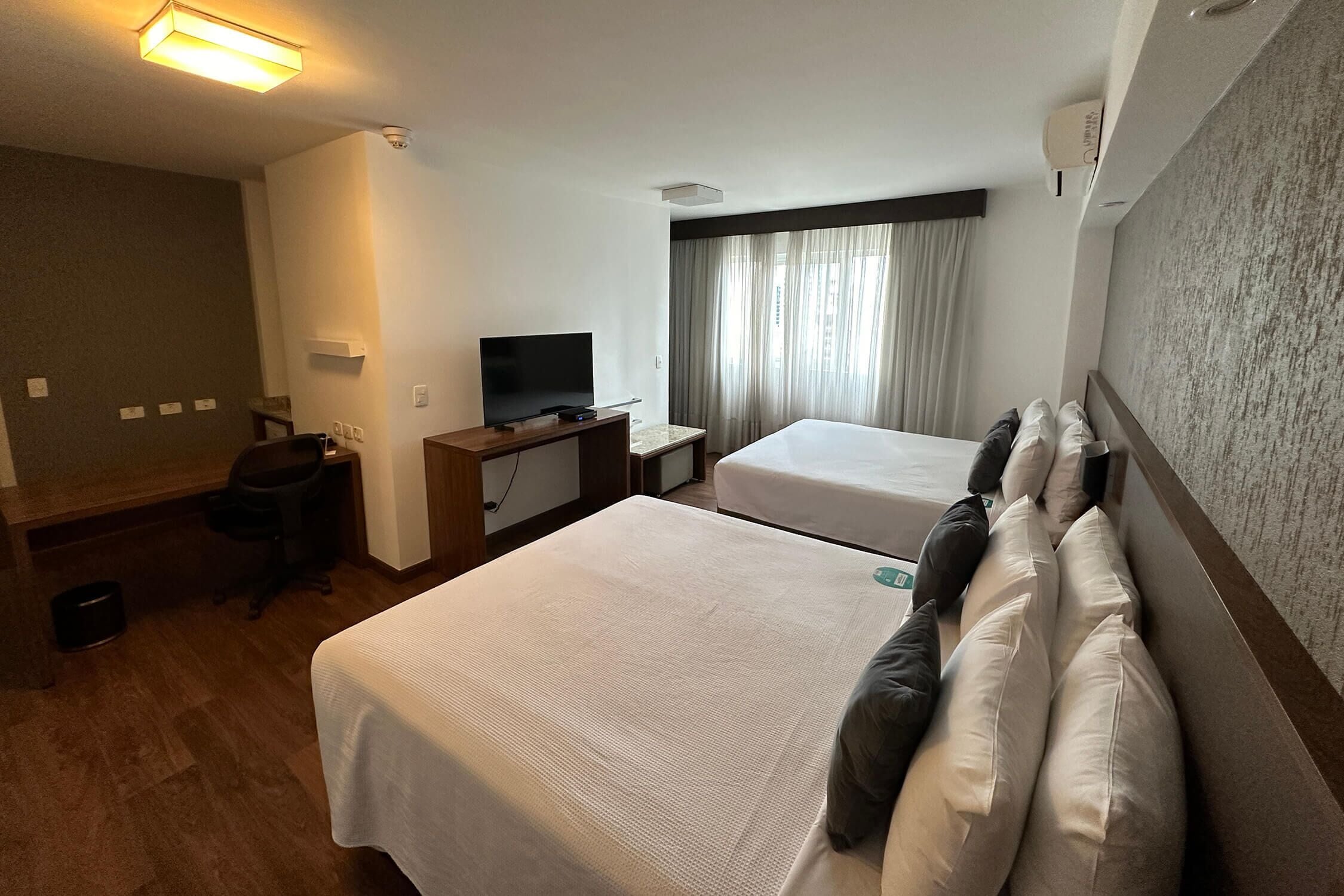 deluxe twin room | in-room safe, desk, free wifi, bed sheets