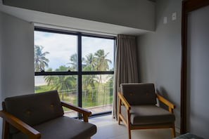 Quarto Frente Mar | Living room | LED TV