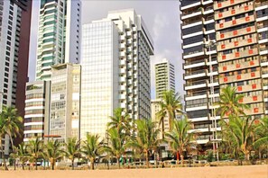 On the beach, white sand, beach towels