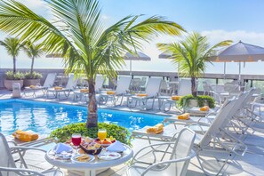 Outdoor pool, pool umbrellas, pool loungers