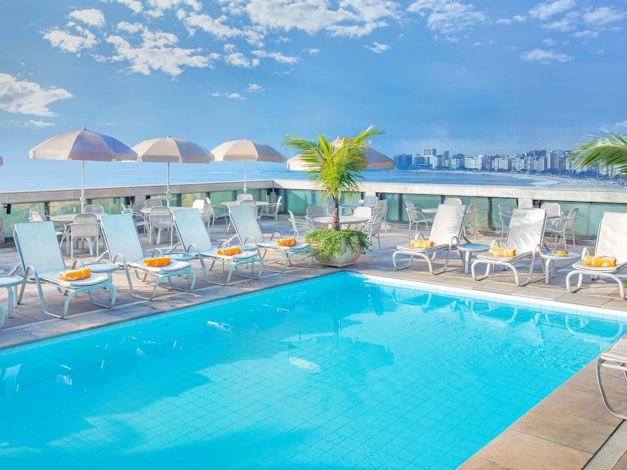 Outdoor pool, pool umbrellas, pool loungers