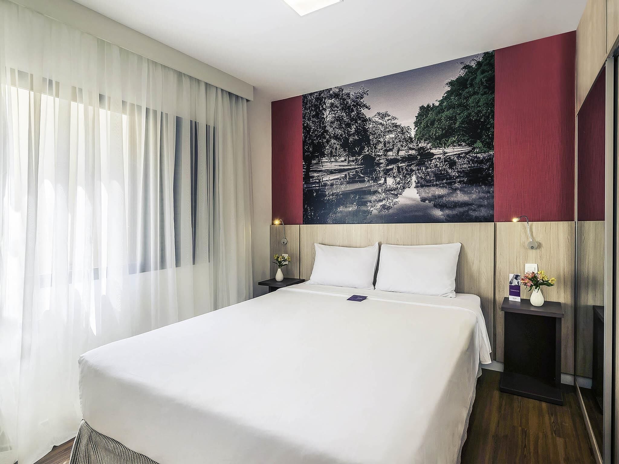 Superior suite, 1 queensize bed met slaapbank | Luxe beddengoed, een minibar, een kluis op de kamer, een bureau
