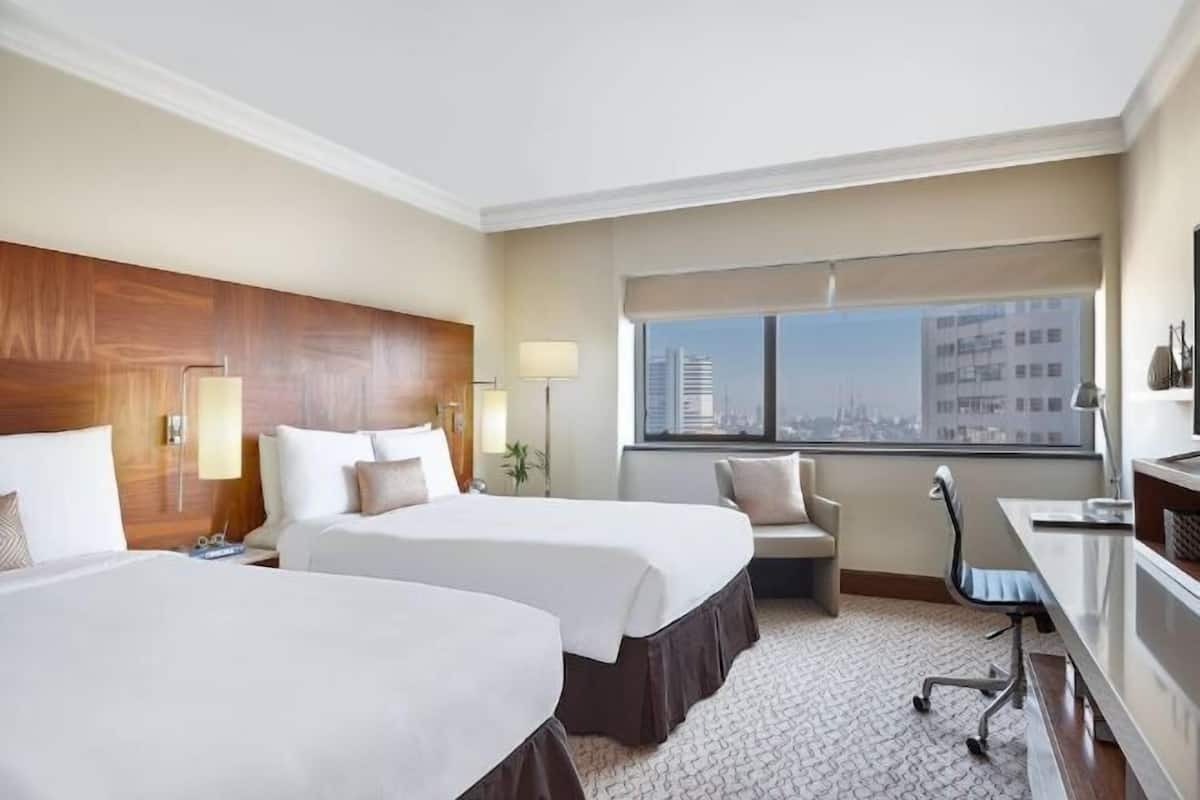 Premium bedding, down duvets, minibar, in-room safe