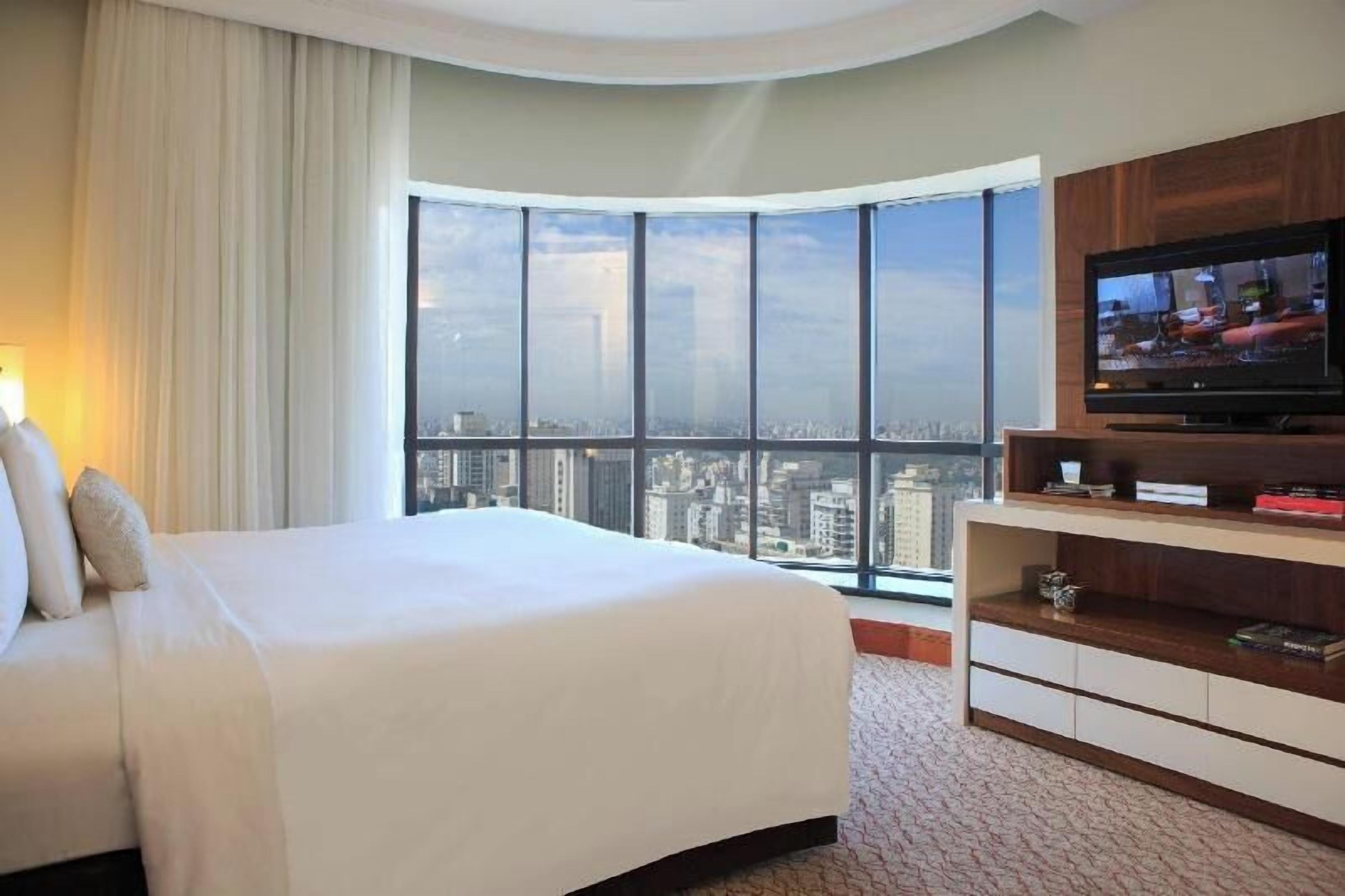 Ropa de cama de alta calidad, edredón y minibar 