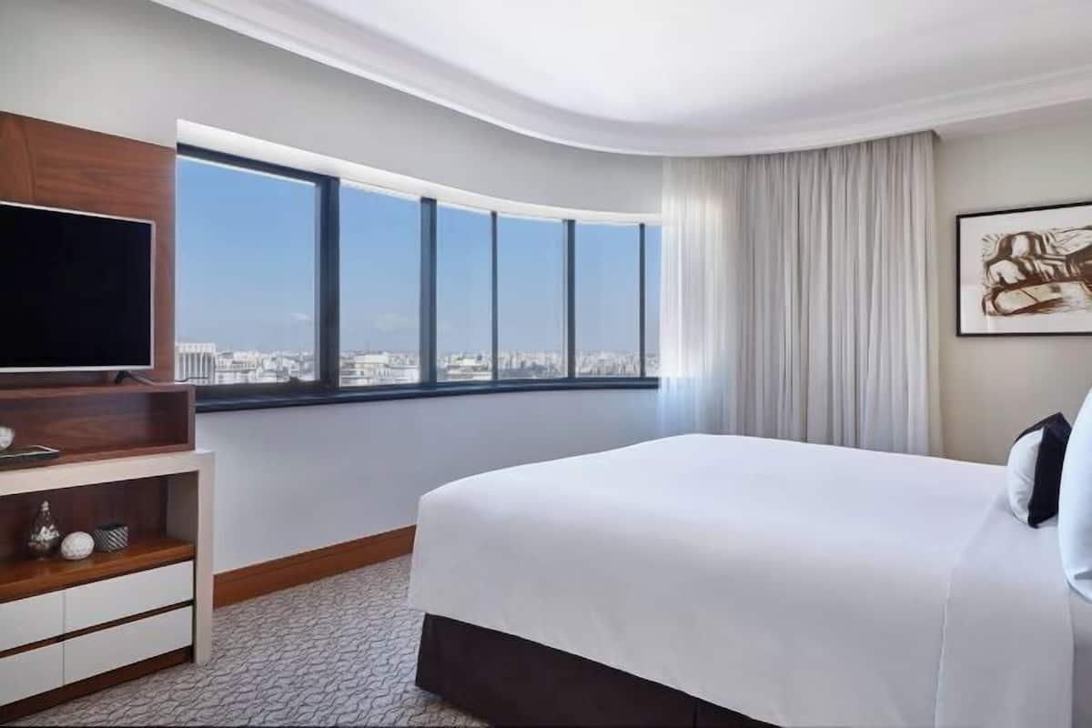 Premium bedding, down duvets, minibar, in-room safe