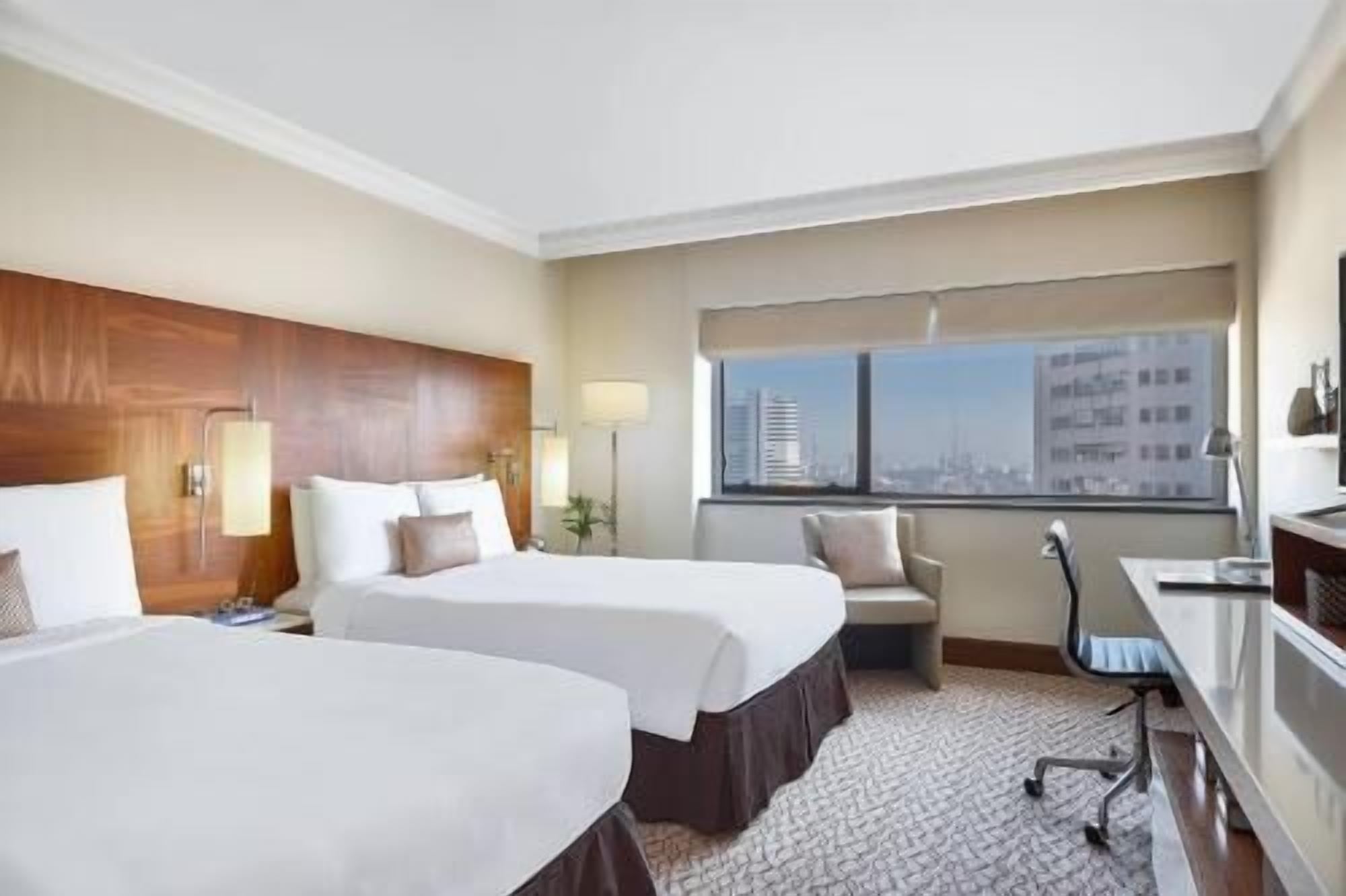 Ropa de cama de alta calidad, edredón y minibar 