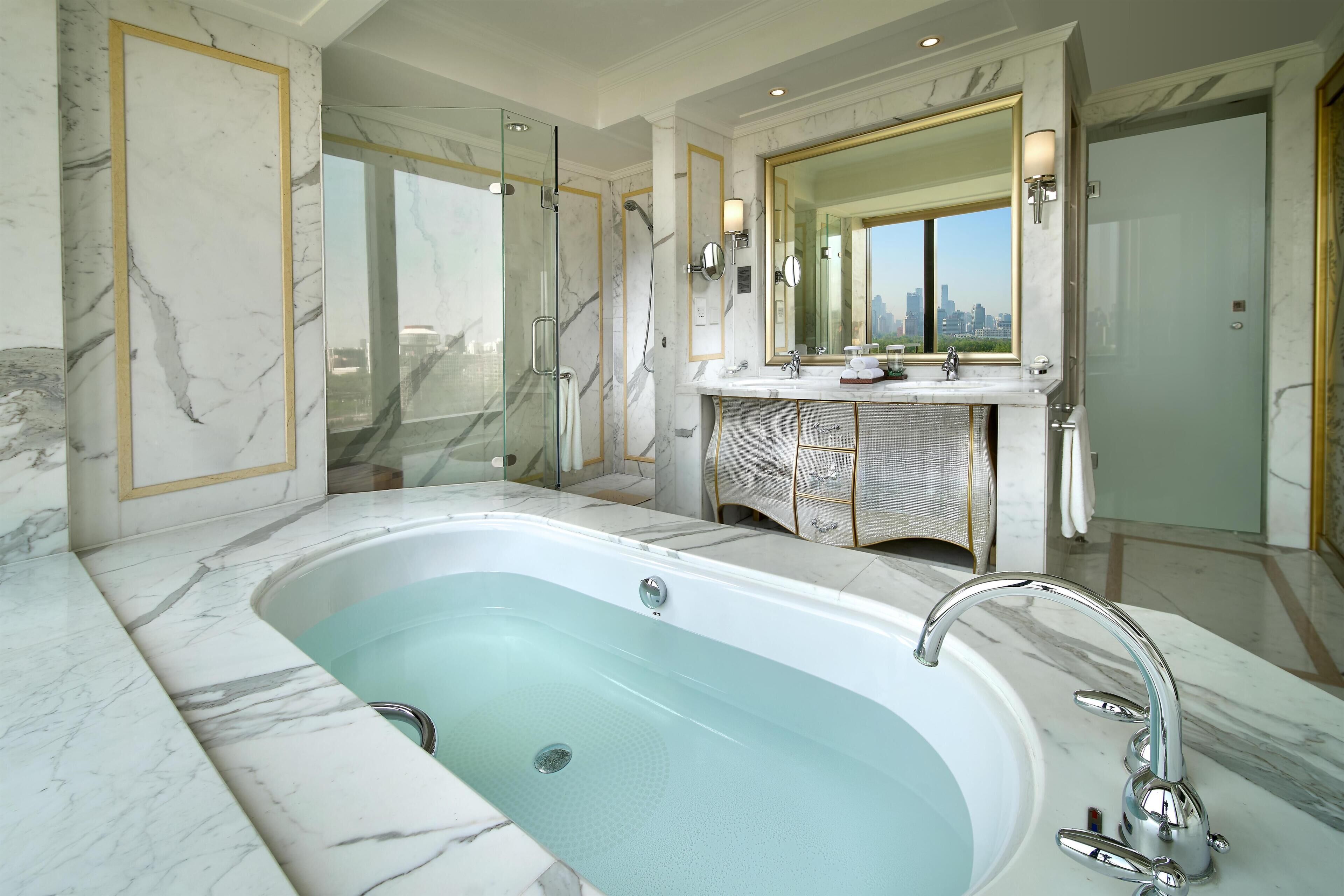 Rainfall showerhead, designer toiletries, hair dryer, bathrobes