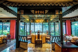 Breakfast, lunch served; local and international cuisine, garden views