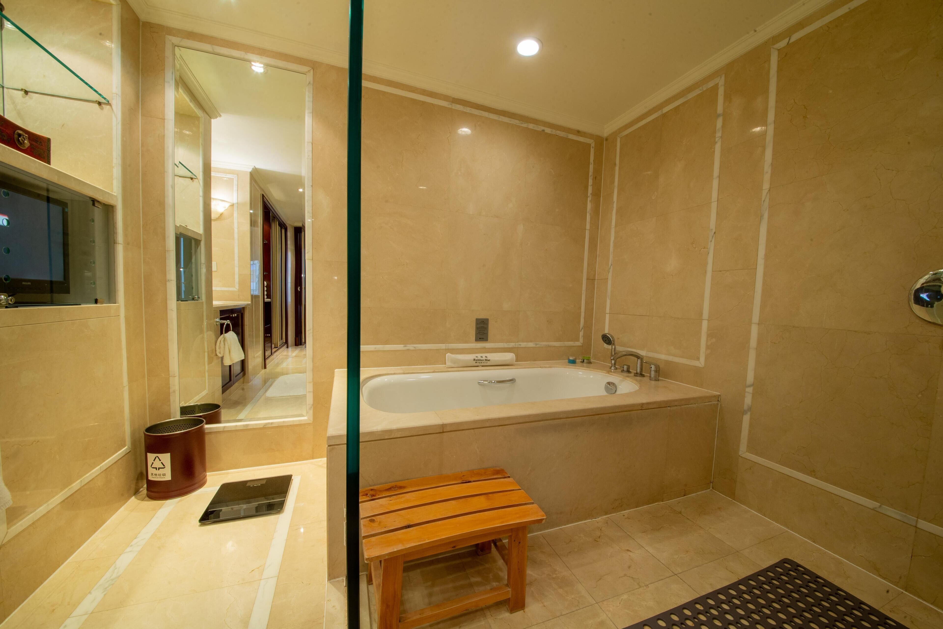 Rainfall showerhead, designer toiletries, hair dryer, bathrobes
