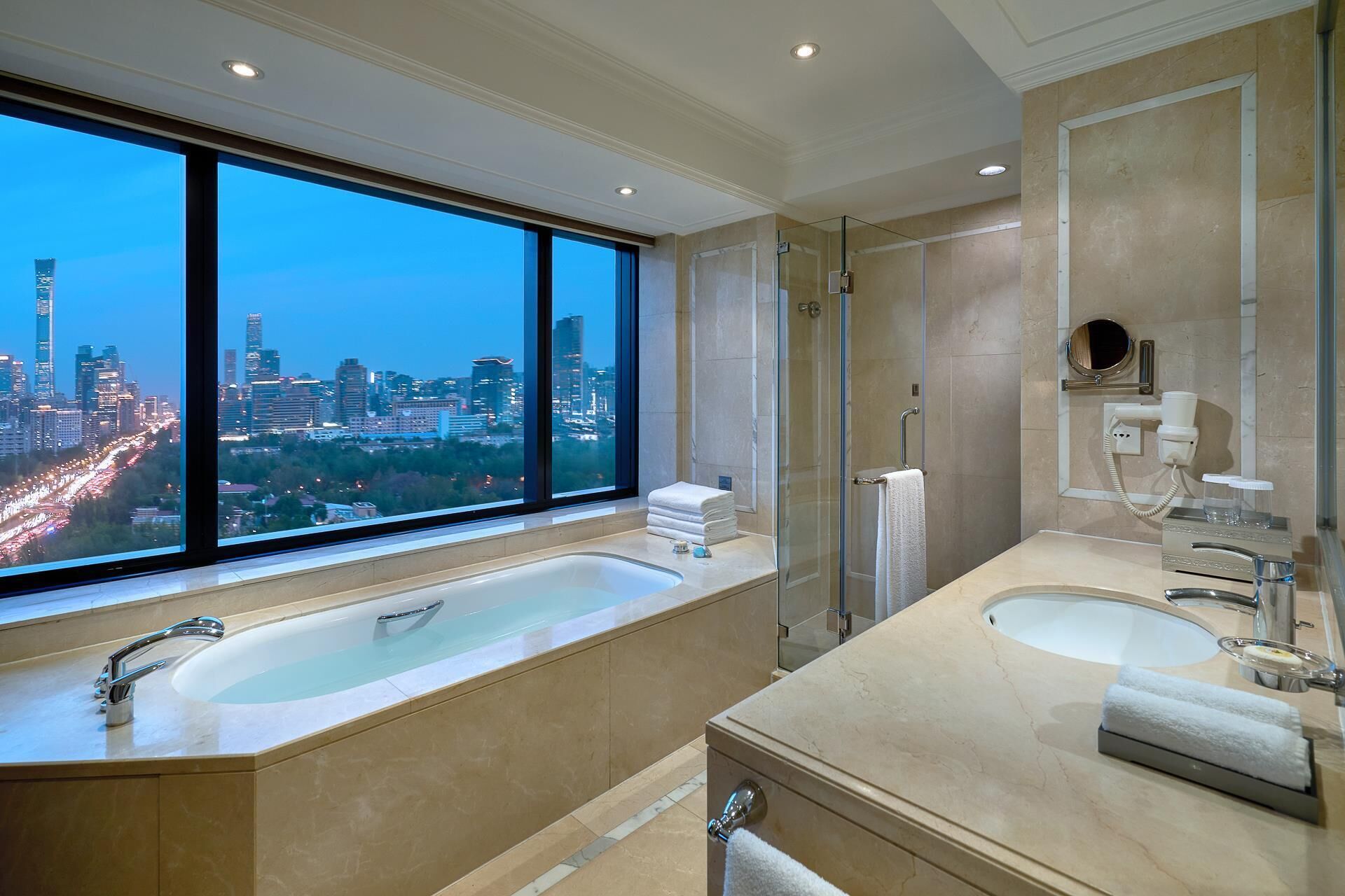 rainfall showerhead, designer toiletries, hair dryer, bathrobes