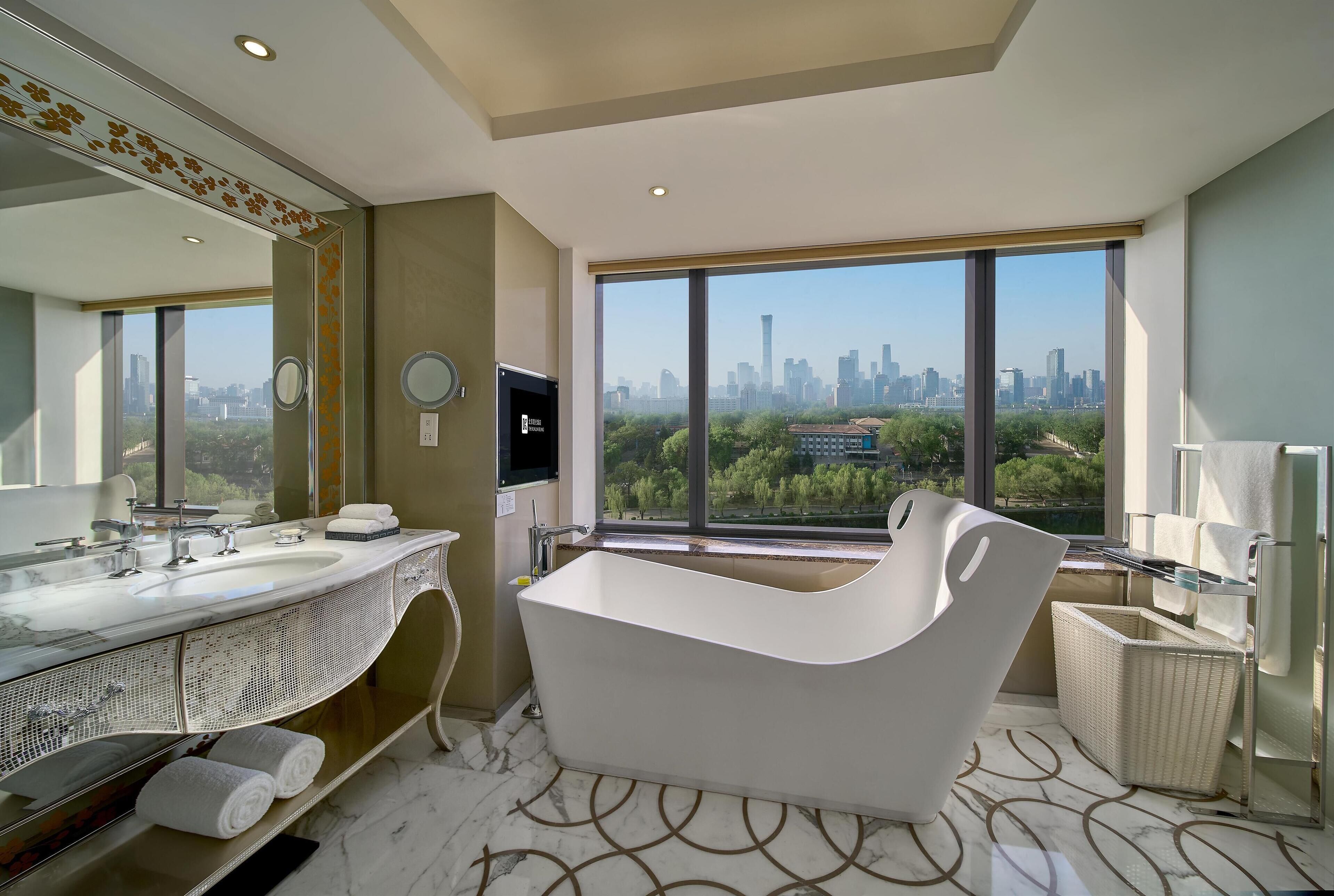 rainfall showerhead, designer toiletries, hair dryer, bathrobes