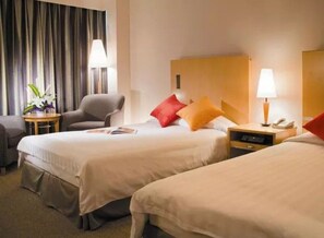 Economy Room, 2 Single Beds | Minibar, in-room safe, blackout curtains, iron/ironing board