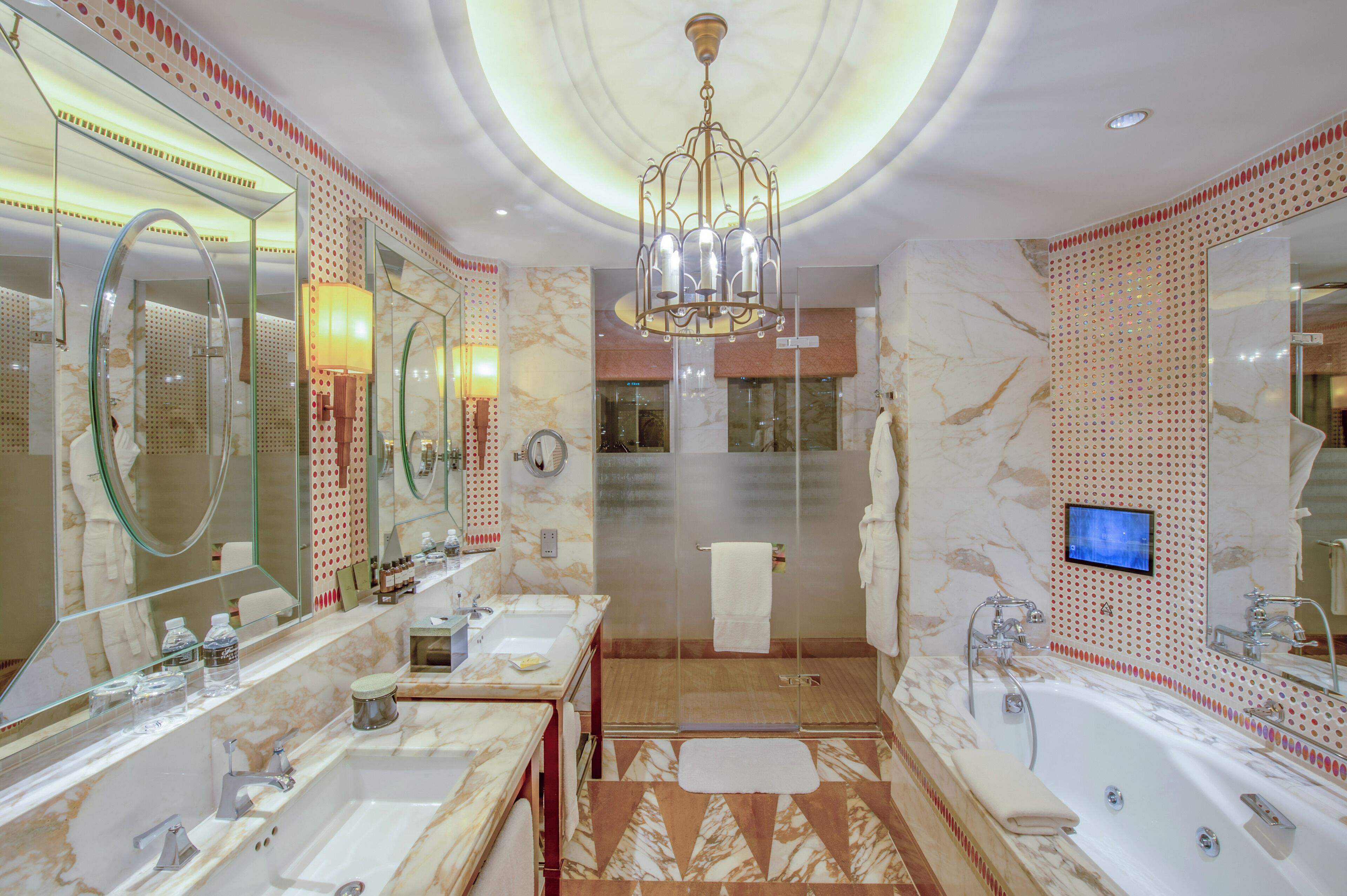 nine nation suite | bathroom | separate bathtub and shower, rainfall showerhead, designer toiletries