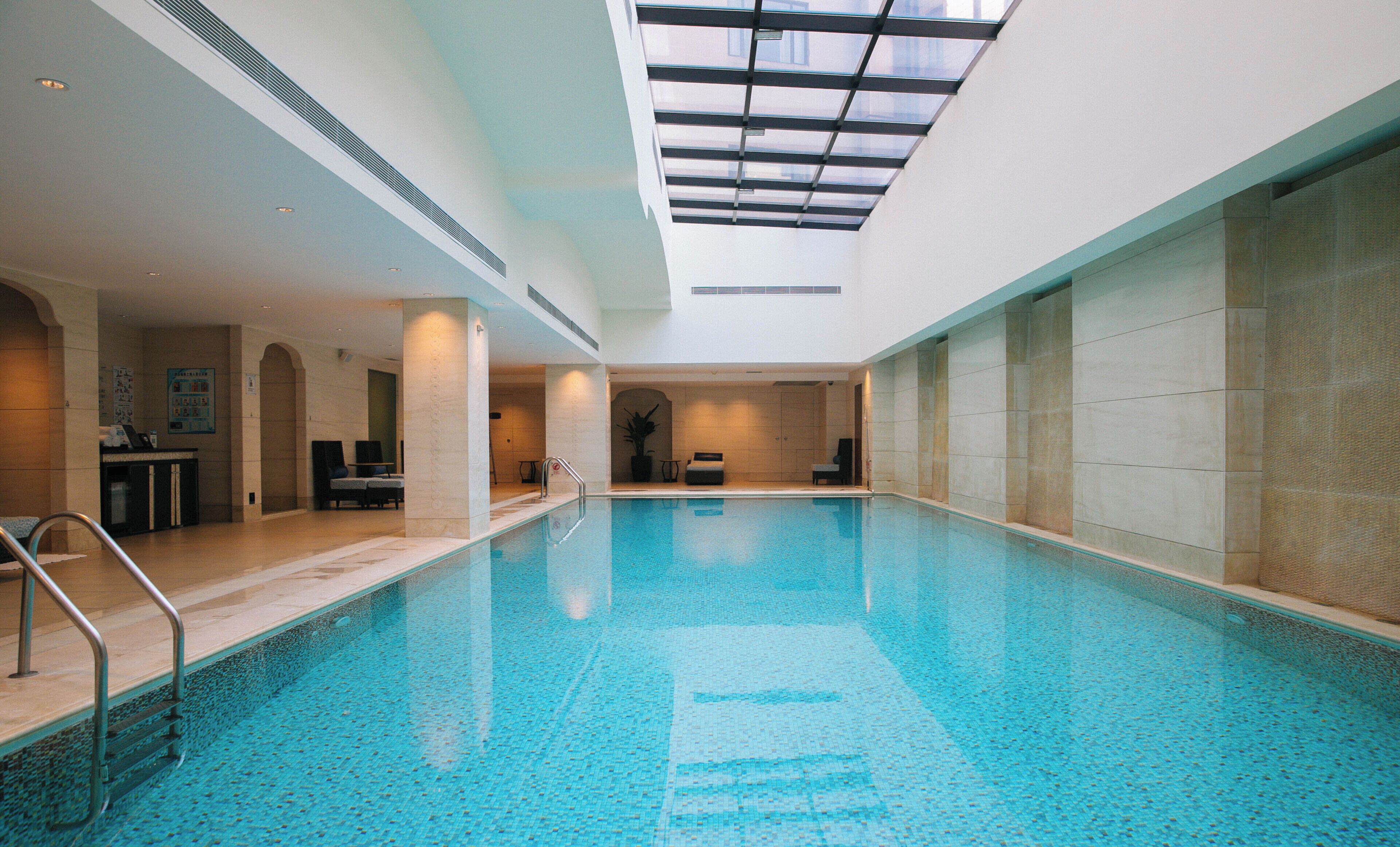 Indoor pool, open 7:00 AM to 10:00 PM, sun loungers