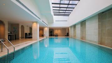 Indoor pool, open 7:00 AM to 10:00 PM, sun loungers