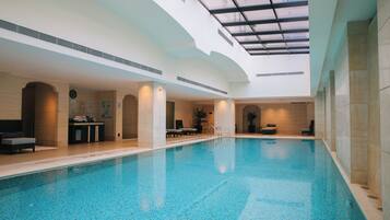 Indoor pool, open 7:00 AM to 10:00 PM, sun loungers