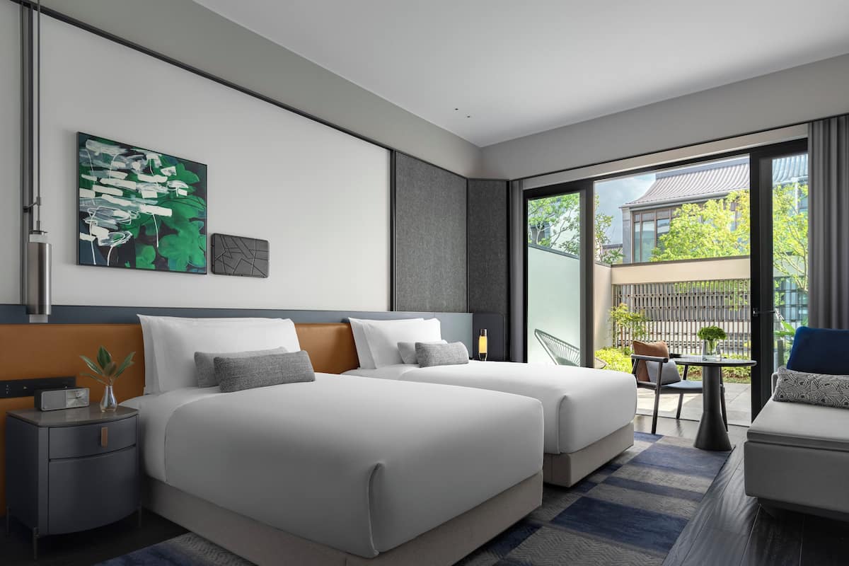 2 Twin Essential Outdoor Living Area | Minibar, in-room safe, individually decorated, individually furnished