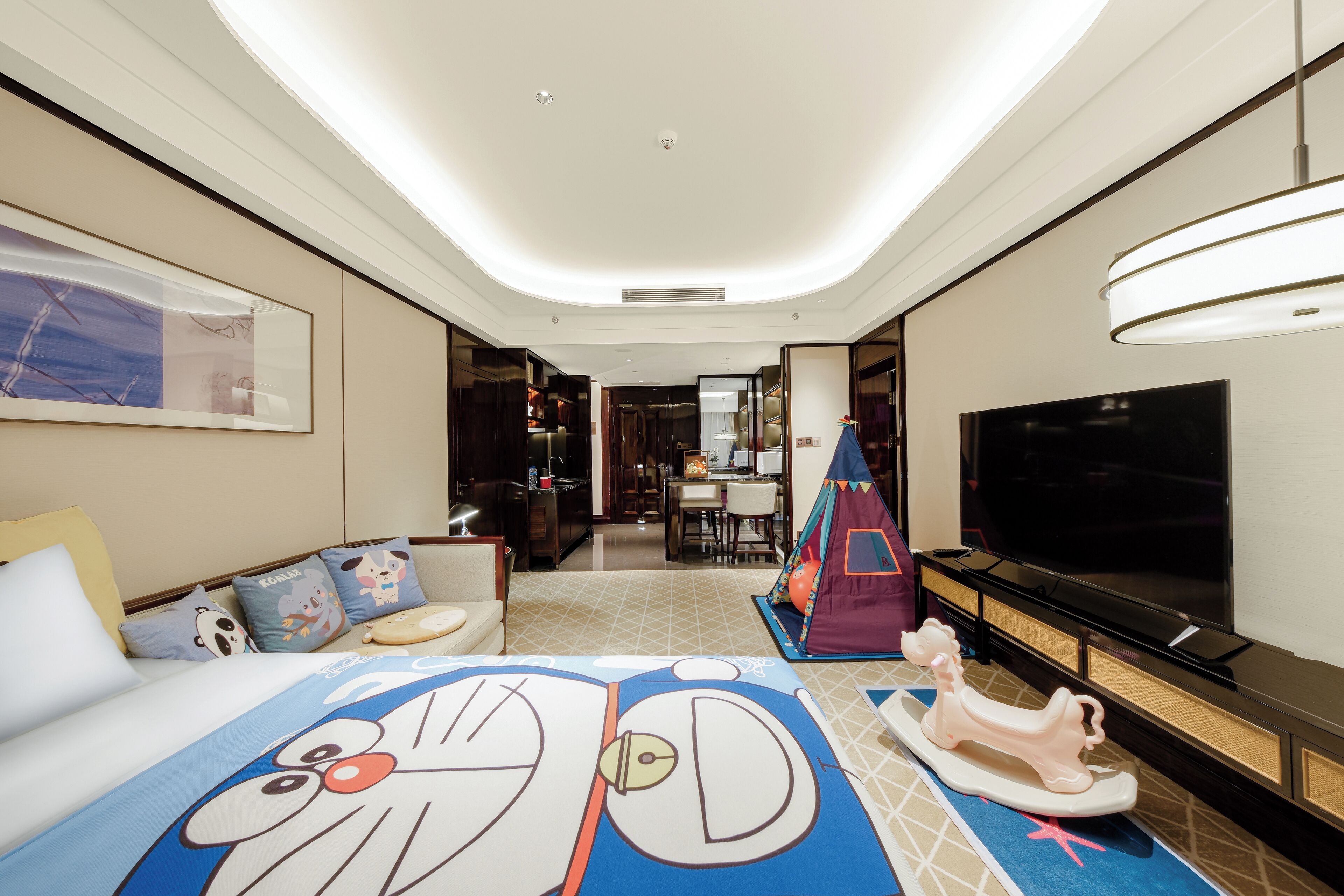 Suite familiar | Edredón, minibar y caja de seguridad en la habitación 