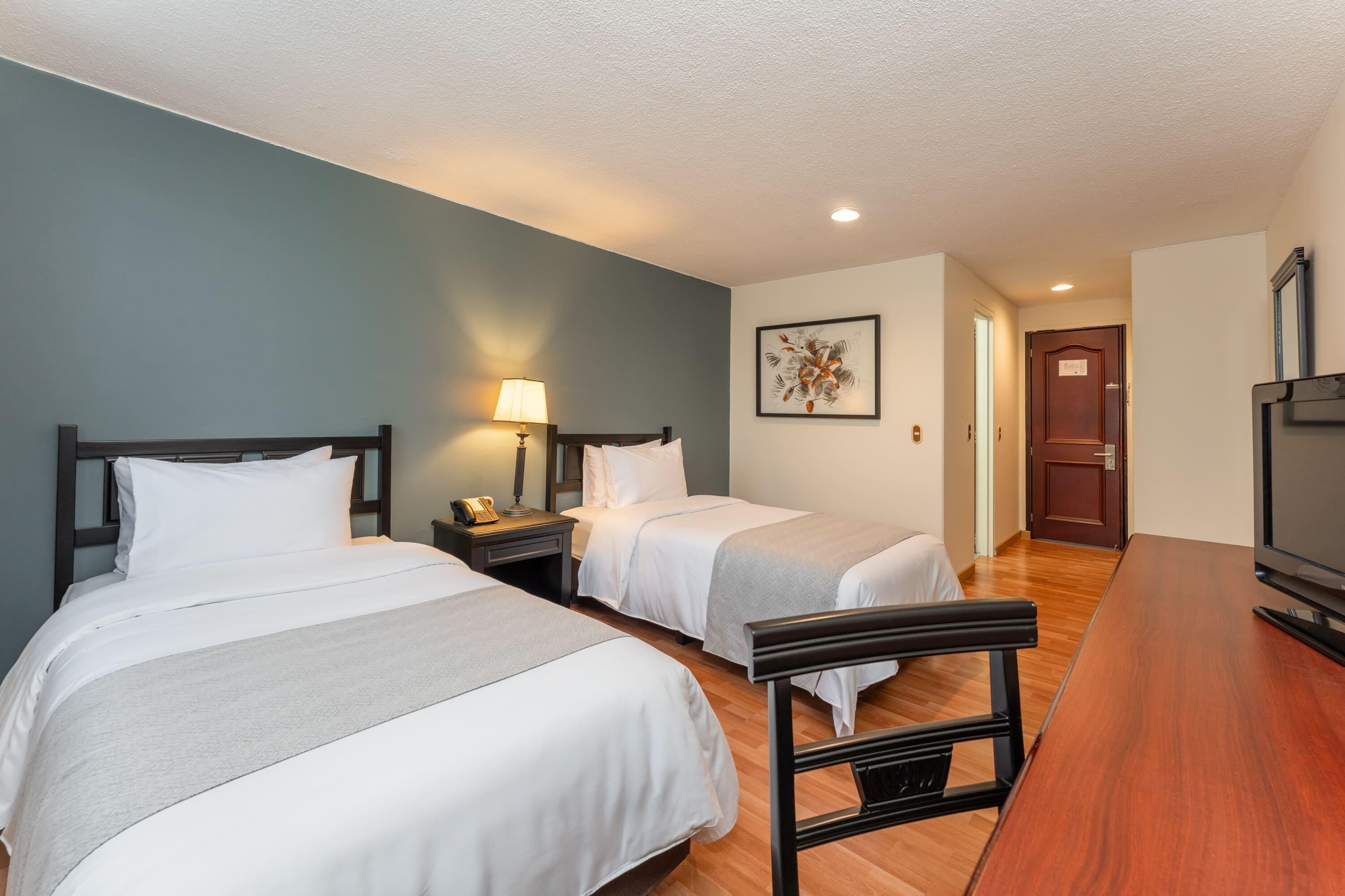 Premium bedding, in-room safe, desk, free cots/infant beds