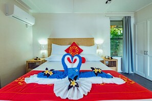 ห้องพรีเมียมสวีท, วิวสวน | เครื่องนอนระดับพรีเมียม, เตียงพร้อมฟูกเสริมที่นอน, ตู้นิรภัยในห้องพัก