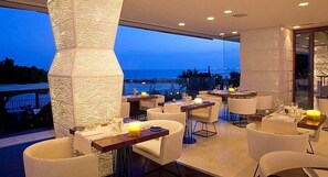 Breakfast, lunch, dinner served; Mediterranean cuisine, beach views