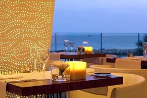 Breakfast, lunch, dinner served; Mediterranean cuisine, beach views
