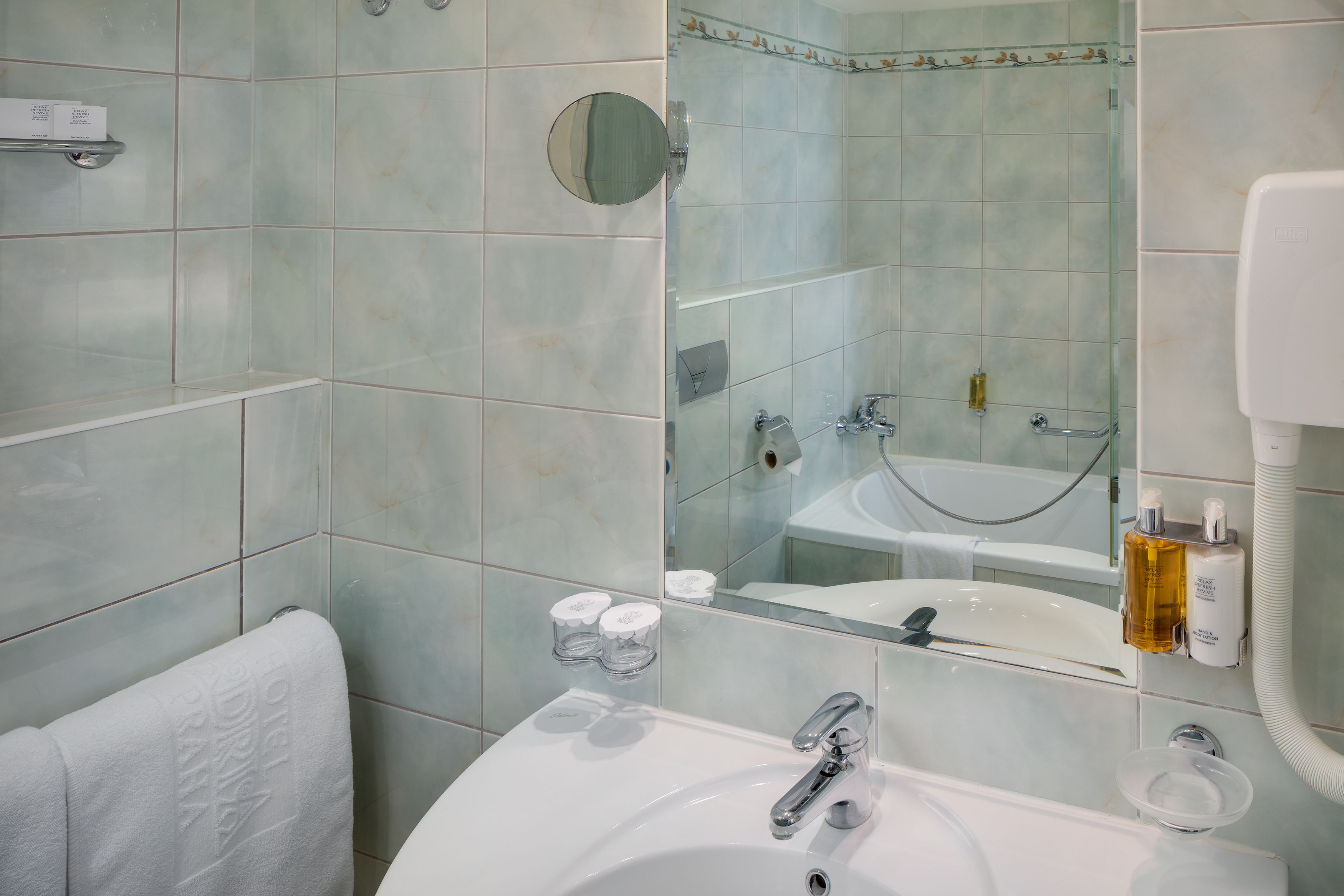 combined shower/bathtub, free toiletries, hair dryer, bathrobes