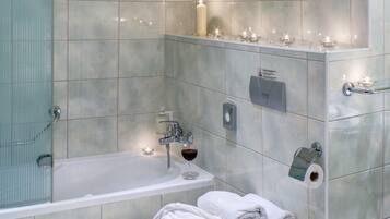 Combined shower/tub, free toiletries, hair dryer, bathrobes