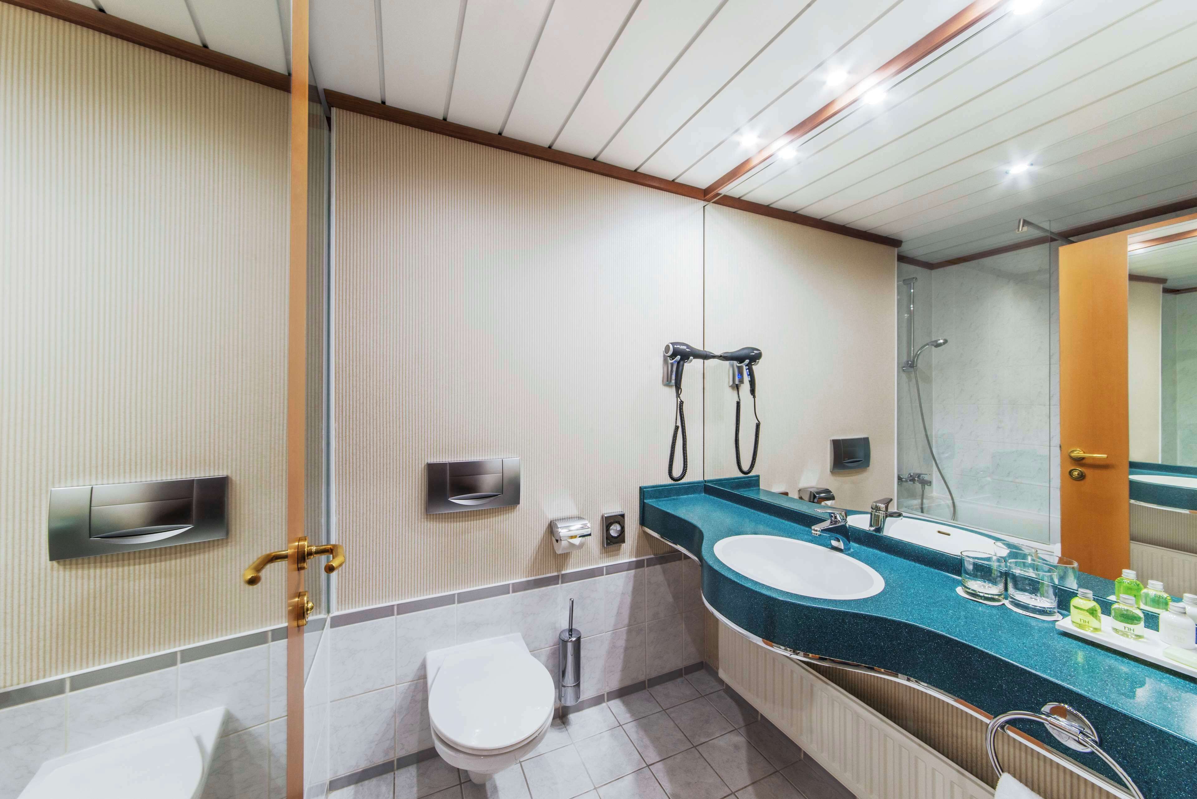 combined shower/bathtub, deep-soaking bathtub, eco-friendly toiletries