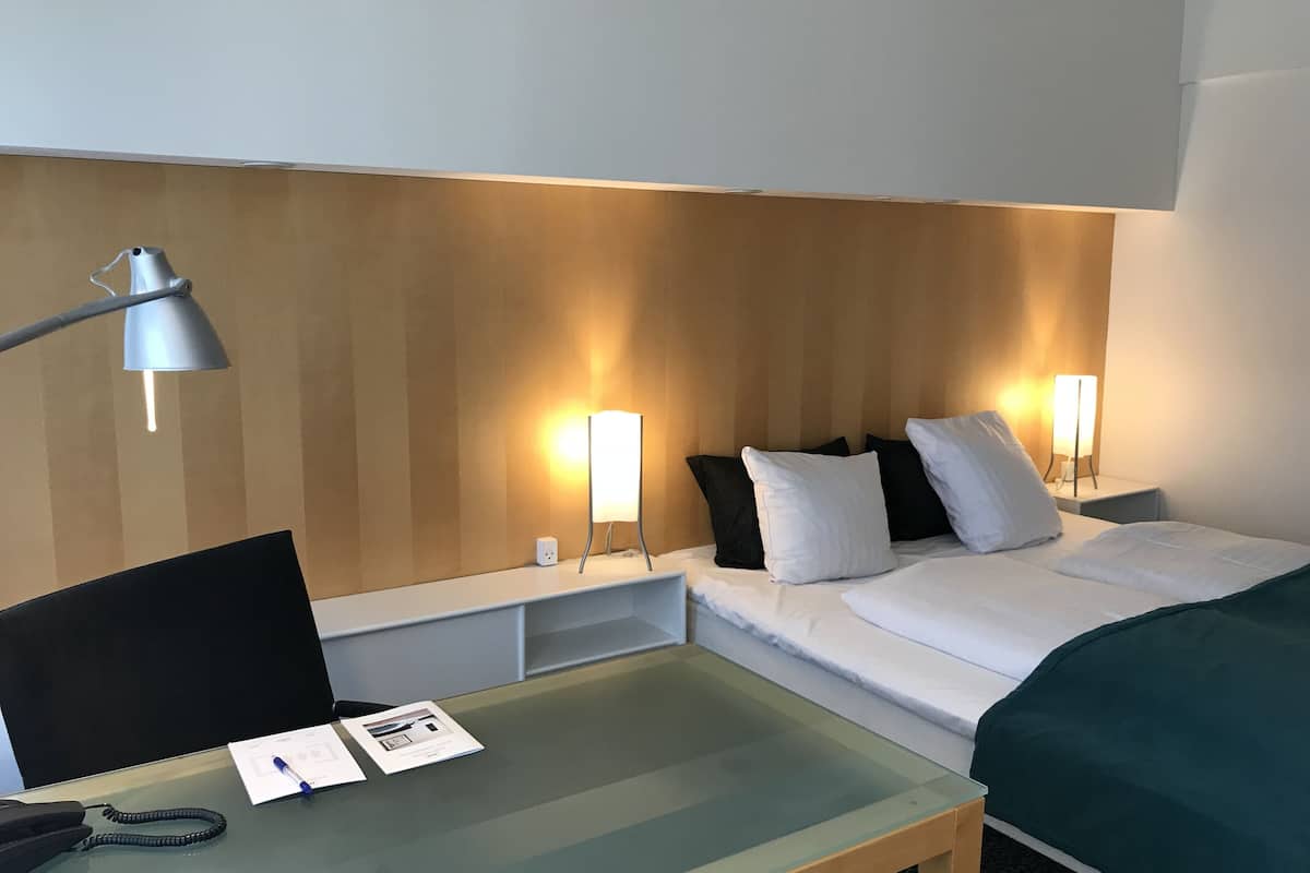 business room, 1 king bed | 1 bedroom, down duvets, desk, blackout curtains