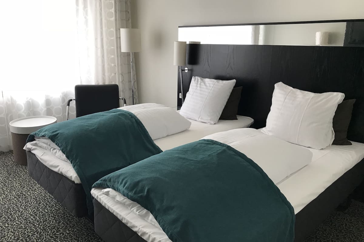 standard twin room | 1 bedroom, down duvets, desk, blackout curtains