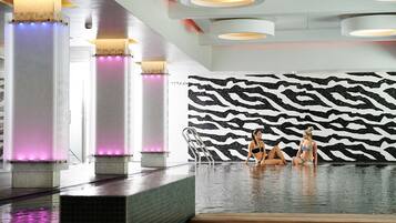 Indoor pool, open 6:00 AM to 9:30 PM, pool loungers