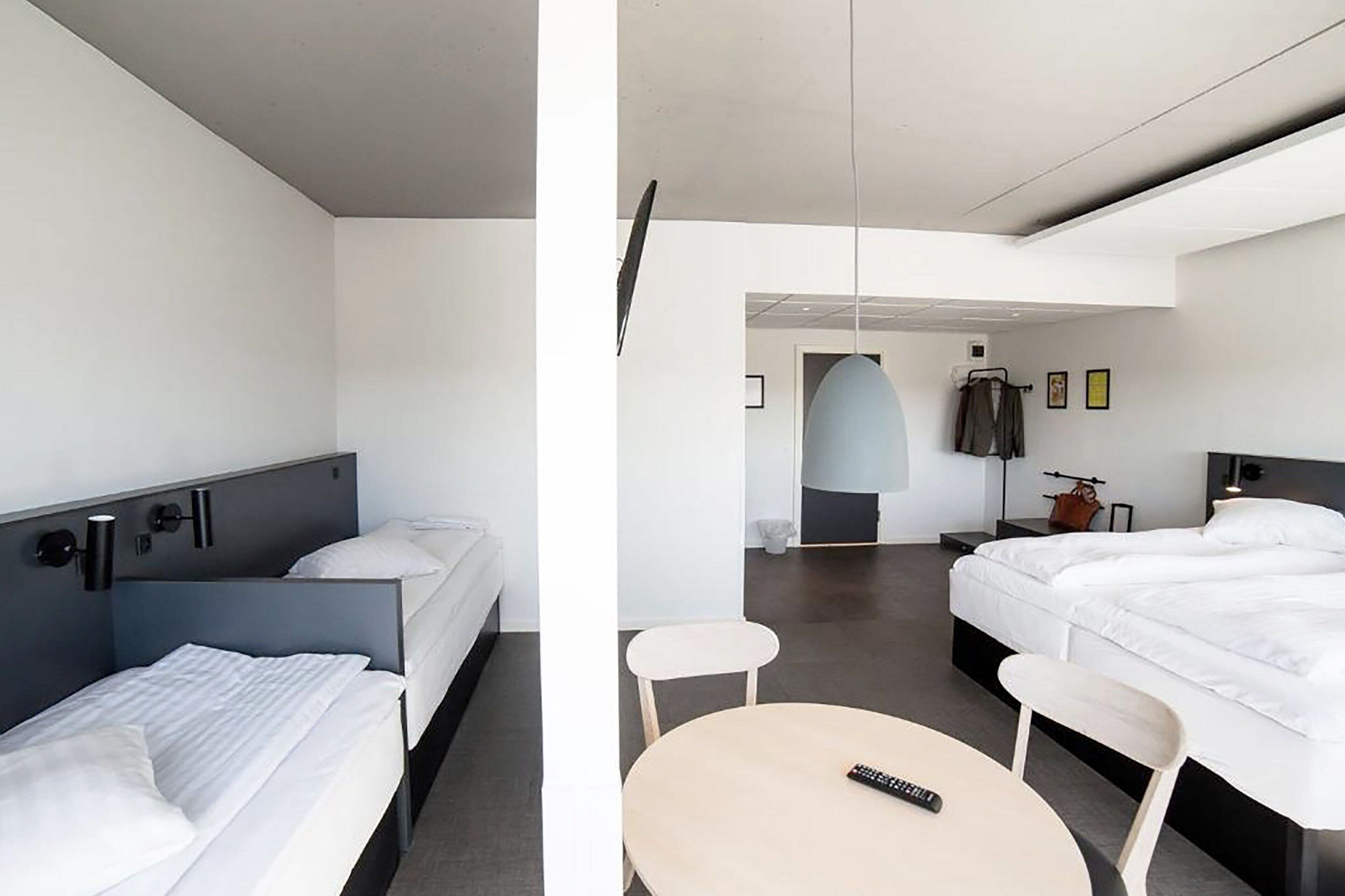 family room | hypo-allergenic bedding, desk, iron/ironing board, cots/infant beds