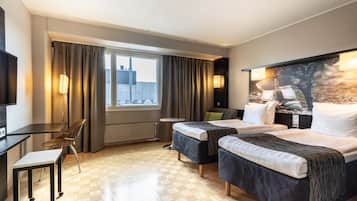 Desk, blackout curtains, free cots/infant beds, free WiFi