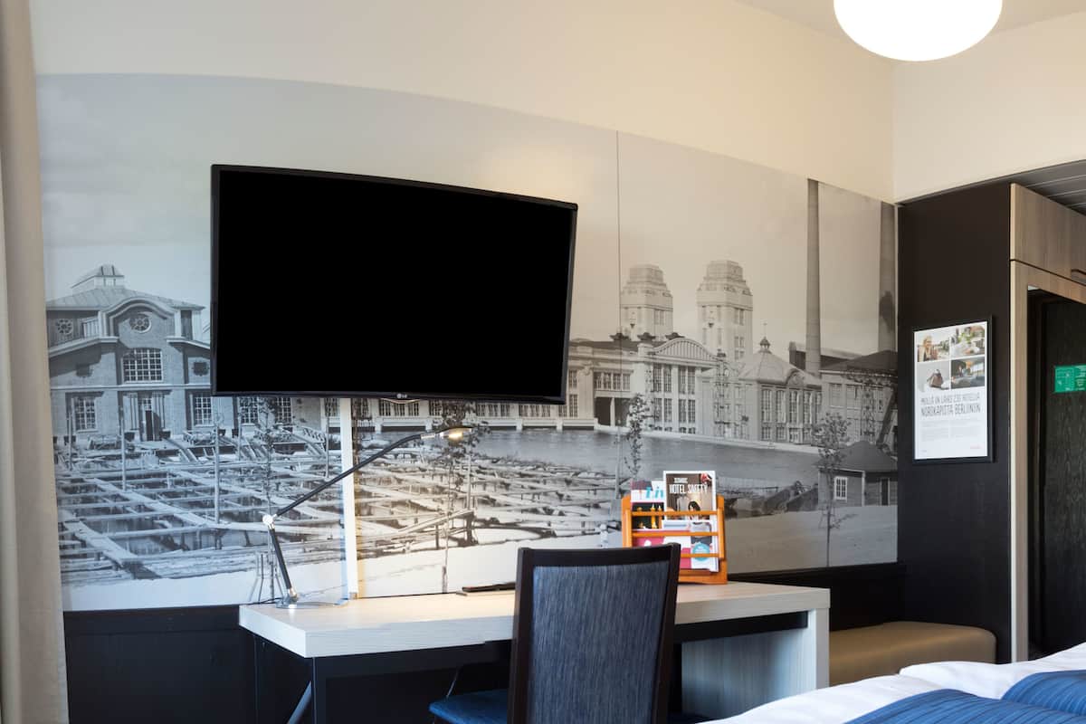 standard single room | in-room safe, desk, laptop workspace, blackout curtains