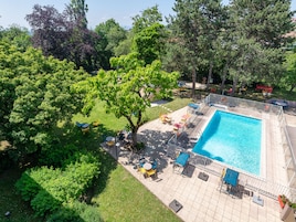 Seasonal outdoor pool, open 8:30 AM to 9:30 PM, sun loungers
